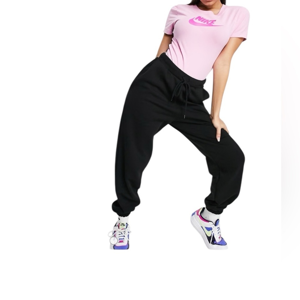 Nike. Pink Bodysuit with Swoosh Logo